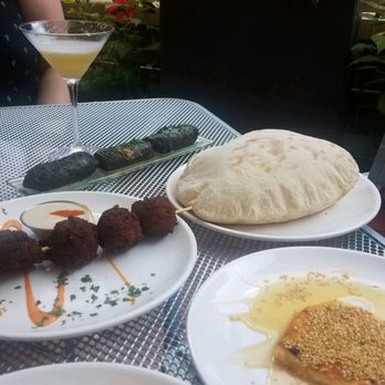 Cypriana - Abfew of our dishes: Cyprus club, grape leaves, pita, roasted feta, spanakopita, and falafel! - Mediterranean Near Me - Baltimore, Maryland