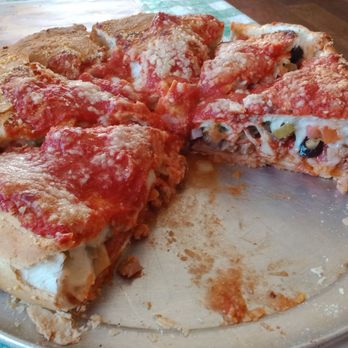 Mama Cimino's - Nearly all of Mama Cimino's specialty Stuffed Pizza: very stuffed! - Pizza Near Me - Lake Geneva, Wisconsin
