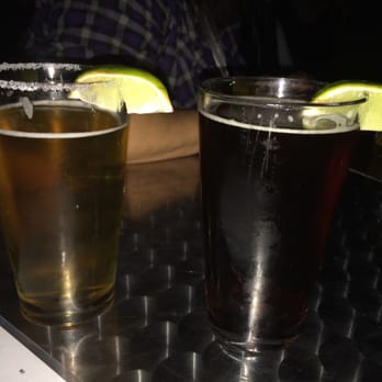 Sanchos - 16 oz draft $4.00 Dos Equis XX (left) Negra Modelo (right) - Cocktail Bars Near Me - San Antonio, Texas