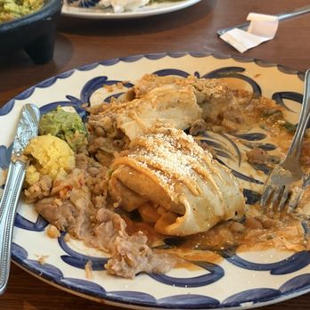 El Torito - A burrito that lost its shape under the weight of the sauce. - Mexican Near Me - Monterey, California