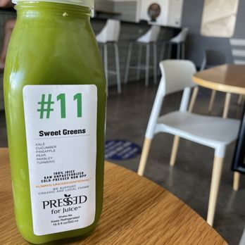 Pressed For Juice - a bottle of green juice on a table - Juice Bars & Smoothies Near Me - Henderson, Nevada Pressed For Juice - a bottle of green juice on a table - Juice Bars & Smoothies Near Me - Henderson, Nevada