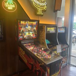 Pulp Fiction pinball machine and classic 80s arcade games. Pulp Fiction pinball machine and classic 80s arcade games.