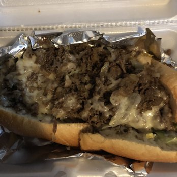The Real Thing - Cheesesteak hoagie with one single tomato slice, lettuce, mayo, onion, mushroom, and hots. - Sandwiches Near Me - Towson, Maryland The Real Thing - Cheesesteak hoagie with one single tomato slice, lettuce, mayo, onion, mushroom, and hots. - Sandwiches Near Me - Towson, Maryland