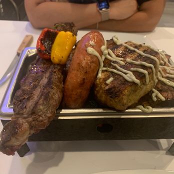Martin Fierro Restaurant - Mixed Caveman Parrillada - Steakhouses Near Me - Naples, Florida Martin Fierro Restaurant - Mixed Caveman Parrillada - Steakhouses Near Me - Naples, Florida