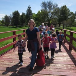 Bert & Ernie's Preschool & Infant Center - Older children at Bert & Ernies walk to a nearby park to enjoy a sack lunch picnic, game of baseball and fun in the playground.