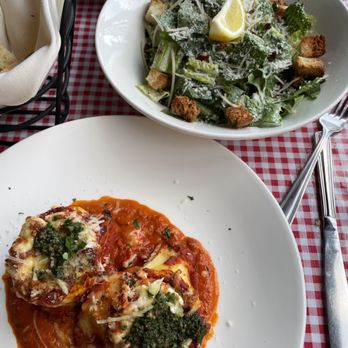 Fiamo - two plates of food on a table - Italian Near Me - Victoria, British Columbia Fiamo - two plates of food on a table - Italian Near Me - Victoria, British Columbia