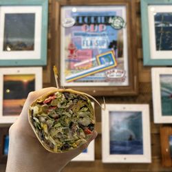 Fruitwood Standup Market - Veggie Mexican Wrap: Romaine, shredded iceberg, black beans, roasted corn, diced tomato, red onion, salsa, white cheddar, tortilla strips