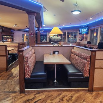 Ustaad G 76 - a view of a restaurant with booths and tables - Indian Near Me - Surrey, British Columbia