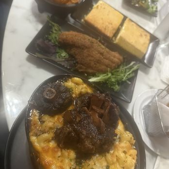 Jordyn's Soul Cafe - Oxtail Mac & cheese with a catfish filet - Soul Food Near Me - Chicago, Illinois Jordyn's Soul Cafe - Oxtail Mac & cheese with a catfish filet - Soul Food Near Me - Chicago, Illinois