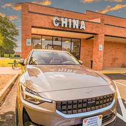 China - Polestar 2 EV (manufactured in China) in front of CHINA RESTAURANT, Gordonsville, VA.