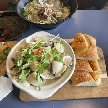 Com Nha Kitchen & Bar - Clams in lemon grass soup - Vietnamese Near Me - Denver, Colorado Com Nha Kitchen & Bar - Clams in lemon grass soup - Vietnamese Near Me - Denver, Colorado