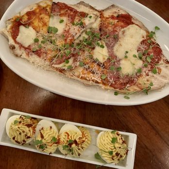 The Living Room - Deviled eggs and meat flatbread - American Near Me - Charleston, South Carolina The Living Room - Deviled eggs and meat flatbread - American Near Me - Charleston, South Carolina