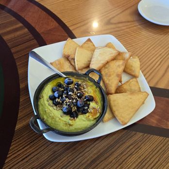 Lyncoya Cafe - Avocado Dip with Warm Pita Chips-- Creamy Avocado, Olive Oil, Sunflower Seeds, Blueberries and Parika - Cafes Near Me - Hendersonville, Tennessee
