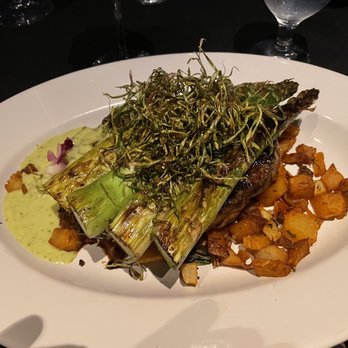Irina's Steak and Seafood - Ribeye Steak with asparagus and chorizo potatoes. - Steakhouses Near Me - West Des Moines, Iowa