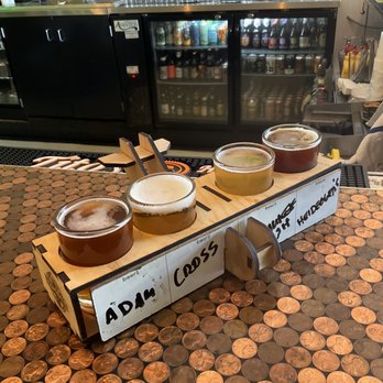 Inventors Brewpub - Flight at bar. - Burgers Near Me - Port Washington, Wisconsin