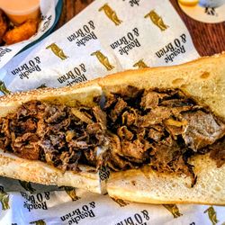 Roache & O'Brien - ONION RINGS: special sauce $10 CHEESESTEAK: cooper sharp, fried onions, seeded long roll $17