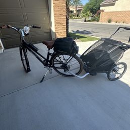Pedego e-bike, cup holder, lock, convertible bag, phone holder, chariot attachment. Pedego e-bike, cup holder, lock, convertible bag, phone holder, chariot attachment.