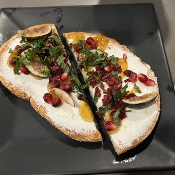 Yafa Cafe - Sourdough toast with goat cheese, fig, cranberry, mint, and pomegranate. - Cafes Near Me - Brooklyn, New York