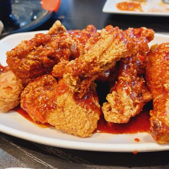 Myungin Dumplings - 1/2 of sweet & spicy fried chicken. More sweetness & not spicy enough (2/10 of my level of spiciness). - Korean Near Me - Northridge, California