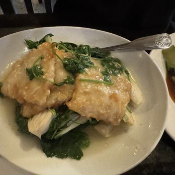 Shanghai Saloon - Garlic Baked Fish Filet - Bars Near Me - San Diego, California Shanghai Saloon - Garlic Baked Fish Filet - Bars Near Me - San Diego, California