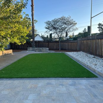 Universal Pavers And Landscaping - day view of artificial turf and sitting wall - Masonry/Concrete Near Me Universal Pavers And Landscaping - day view of artificial turf and sitting wall - Masonry/Concrete Near Me