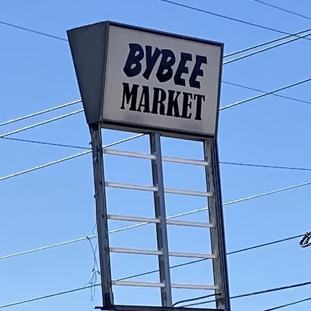 Bybee Market - a sign for a market - Grocery Near Me - Bybee, Tennessee