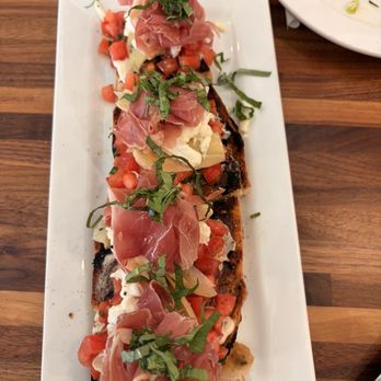 Isola - Bruschetta make sure you order and not the porkschetta. Although I'm sure that's delicious as well. - Italian Near Me - Encinitas, California