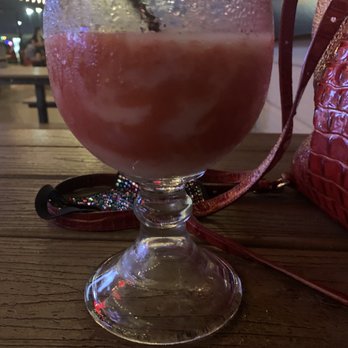 Bombshells Restaurant & Bar - Red white and blue flag without the blue. It is merely Strawberry and Pina colada daiquiri - Sports Bars Near Me - Katy, Texas