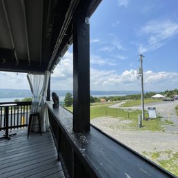 a view of the ocean from a porch