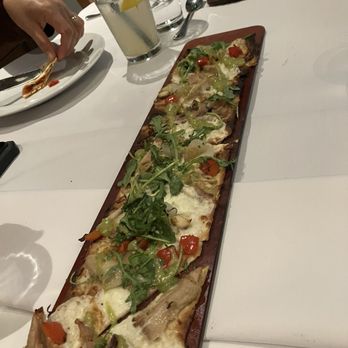 Seasons 52 - basil Pesto Chicken And Fresh Mozzarella and roasted tomato flatbread - New American Near Me - Paramus, New Jersey Seasons 52 - basil Pesto Chicken And Fresh Mozzarella and roasted tomato flatbread - New American Near Me - Paramus, New Jersey