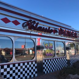 Shiny metal facade, old diner style. You can't miss it.