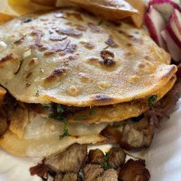 Mulitas (one carne asada, one al pastor) Mulitas (one carne asada, one al pastor)