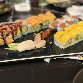 Machi Sushi Hibachi - Mango roll on right side , mostly raw fish dish - Sushi Bars Near Me - Affton, Missouri Machi Sushi Hibachi - Mango roll on right side , mostly raw fish dish - Sushi Bars Near Me - Affton, Missouri