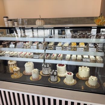Luna's Cakes & Coffee - Cake display case - Custom Cakes Near Me - Newton, Massachusetts Luna's Cakes & Coffee - Cake display case - Custom Cakes Near Me - Newton, Massachusetts