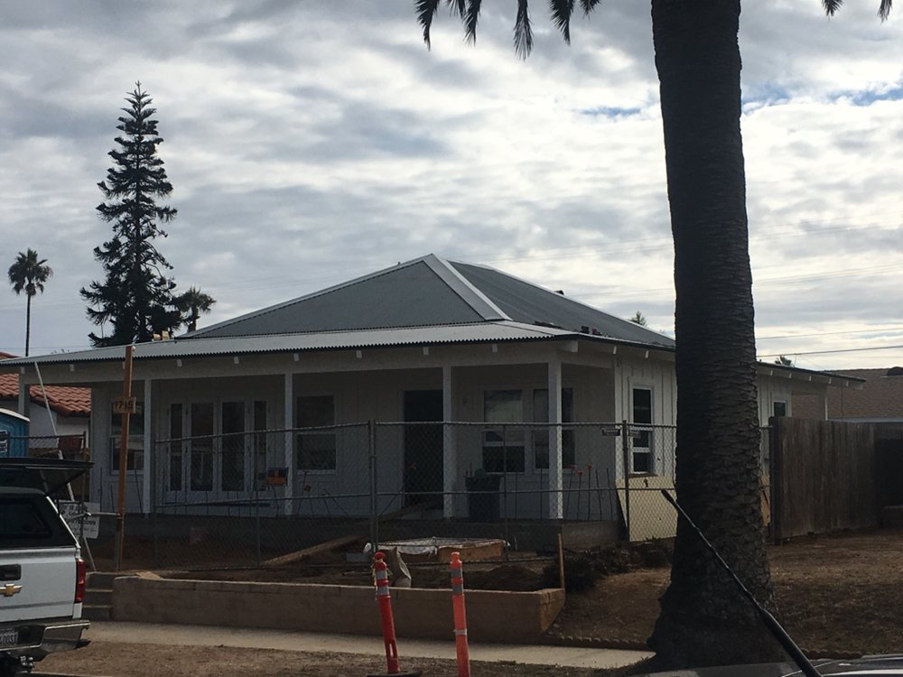 Slide of Vulcan Roofing Co