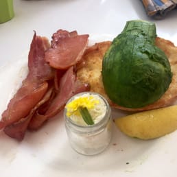 Half an avocado, two pieces of toast (nicely done), bacon that's a bit on the dry side, soft feta and a sad slice of lemon ($16) Half an avocado, two pieces of toast (nicely done), bacon that's a bit on the dry side, soft feta and a sad slice of lemon ($16)