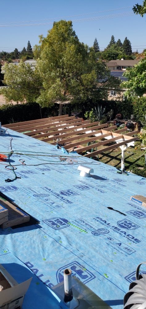Slide of Three Clovers Roofing