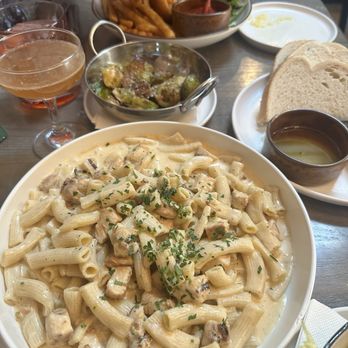 Marconi Mercato - Chicken rigatoni and a side of Brussel sprouts - Italian Near Me - St. Louis, Missouri Marconi Mercato - Chicken rigatoni and a side of Brussel sprouts - Italian Near Me - St. Louis, Missouri