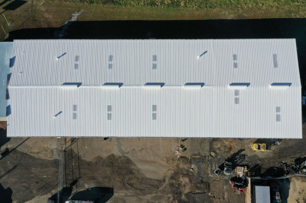 Slide of Tucker Commercial Roofing