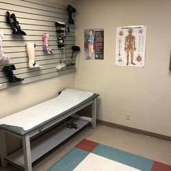 Hanger Clinic - A patient room with displays of some of the braces Hanger provides.