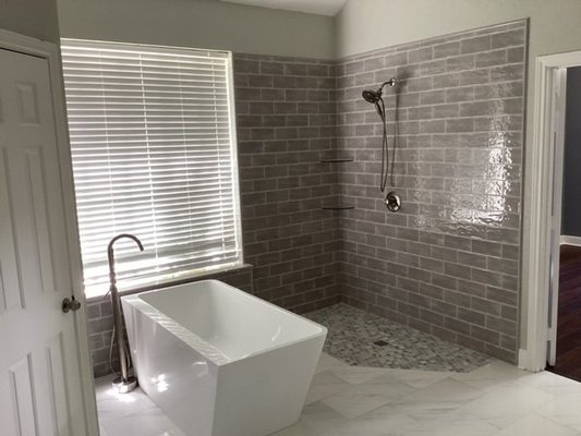 Damage Restoration Bathroom Remodels - Here are some of our damage restoration bathroom remodels! Contact us today for quality construction for every project! We pride ourselves on paying close attention to detail while giving our clients an intimate experience so you always know what is going on with your project!