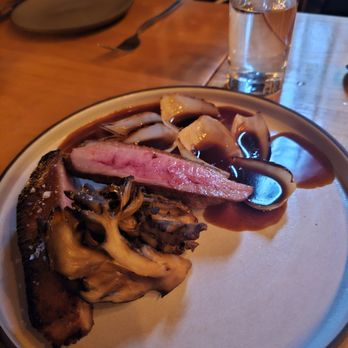 Confidant - Hudson Valley Duck Breast- Maitake, confit shallot, and date jus. $51. More standard, but very tasty - New American Near Me - Brooklyn, New York