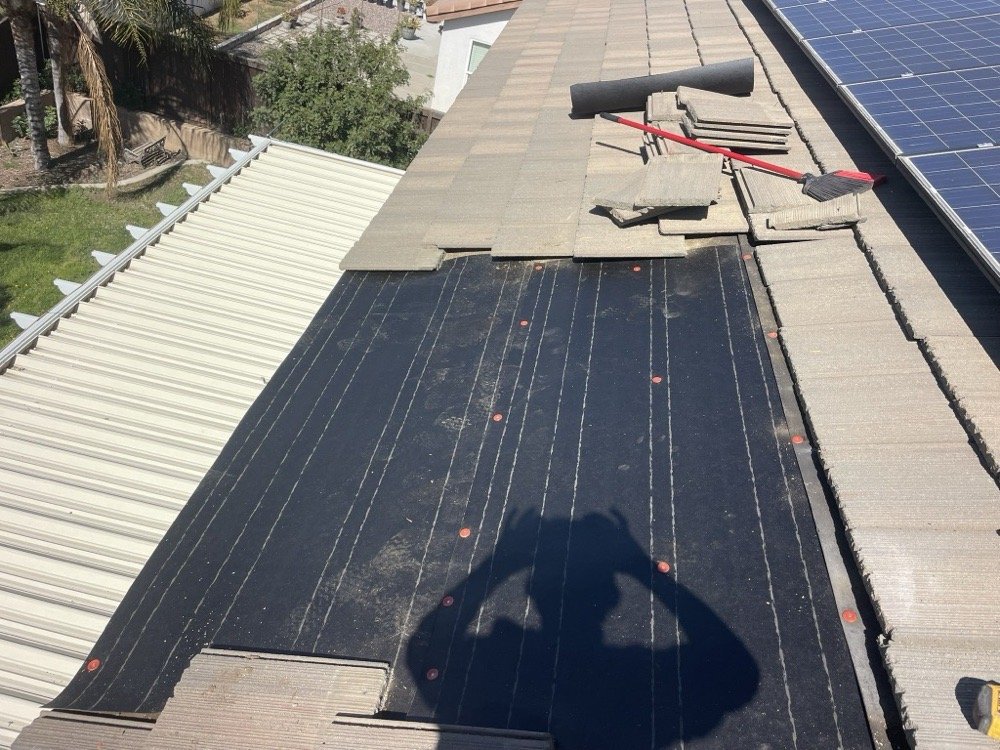 Slide of A Town Roofing