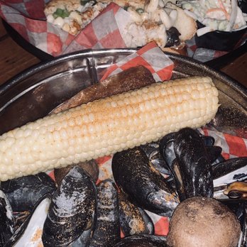 Phillips Seafood - Mac & Cheese Hotdog Sandwich  Mussel Bucket - Seafood Near Me - Baltimore, Maryland