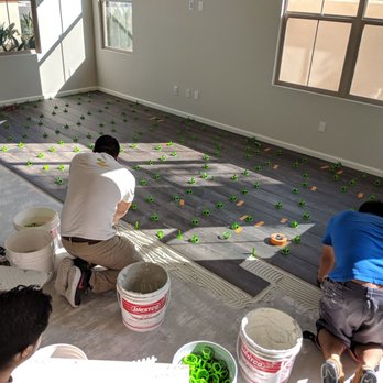 California Flooring Service - Jason's team working magic to ensure all tiles are leveled - Flooring Near Me California Flooring Service - Jason's team working magic to ensure all tiles are leveled - Flooring Near Me