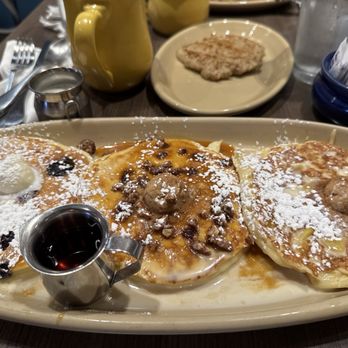 Snooze, an A.M. Eatery - Pancake Flight - Blueberry and cinnamon roll and pineapple upside down with chicken patty sausage - Breakfast & Brunch Near Me - Tustin, California