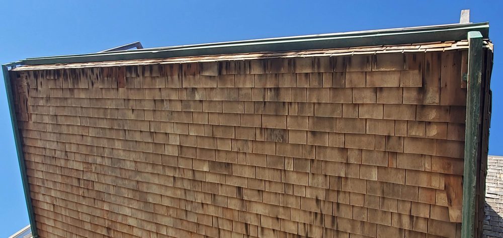 Slide of Neighbor's Roofing