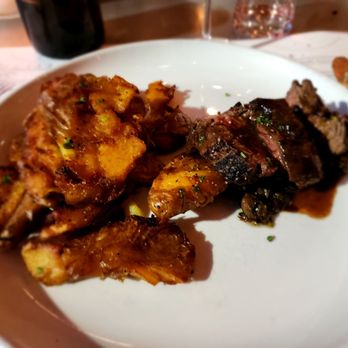 Sixty Vines - The staff split the Wood Grilled Steak for us - Wine Bars Near Me - Winter Park, Florida