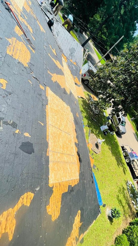 Slide of Santos Roofing