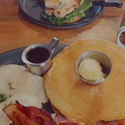 Pancakes, bacon, sausage and egg over easy